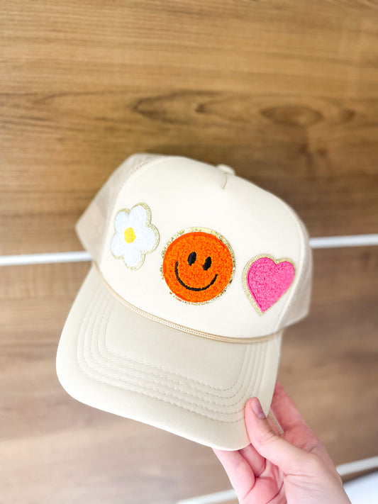 Tan smiley trucker hat